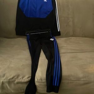 Adidas black and blue jogging suit. Pants and Jacket are Youth Large. Unused